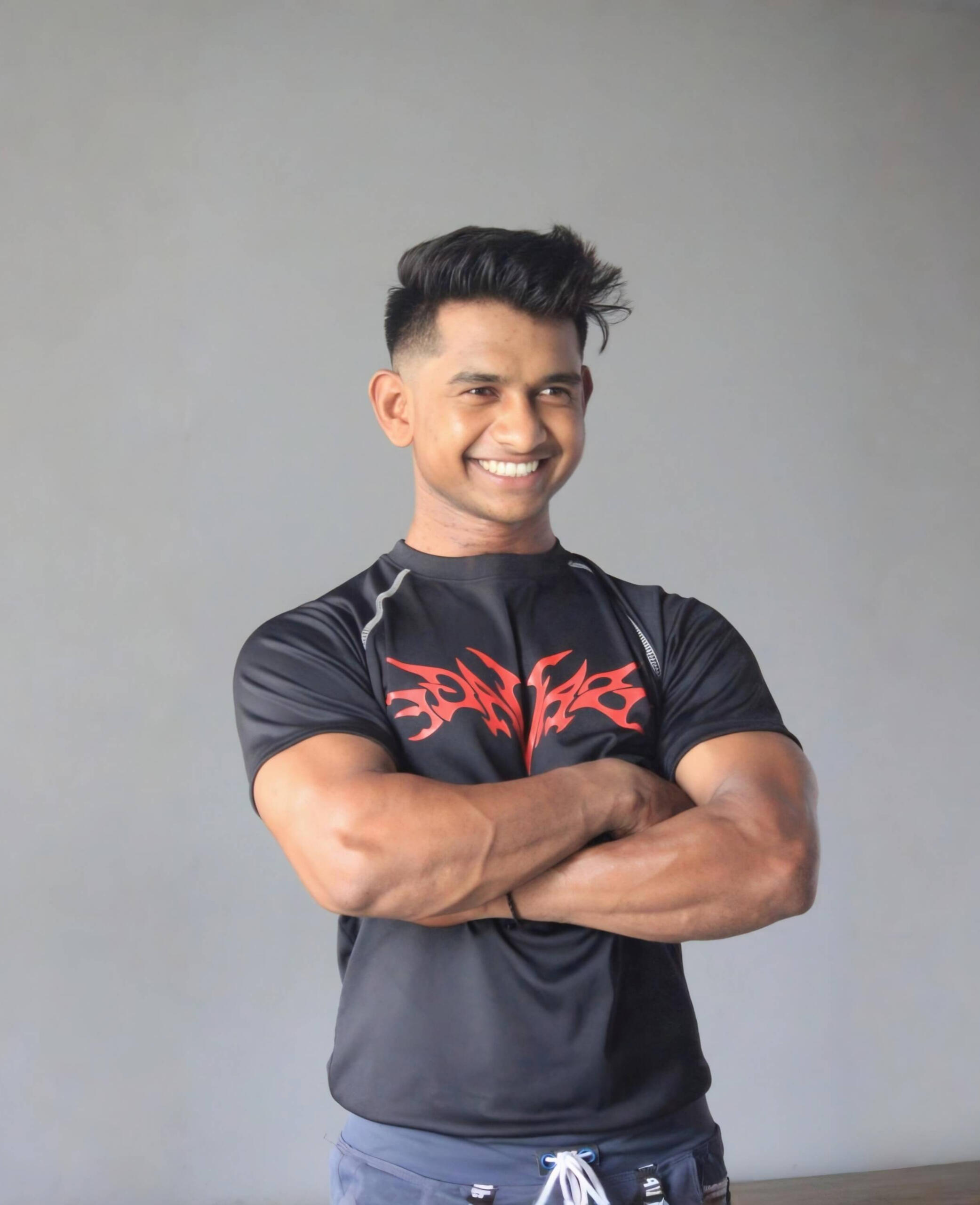 Meet Kundan Ade - Your Fitness Coach Kundan Ade, fitness coach, smiling and ready to help you transform your body